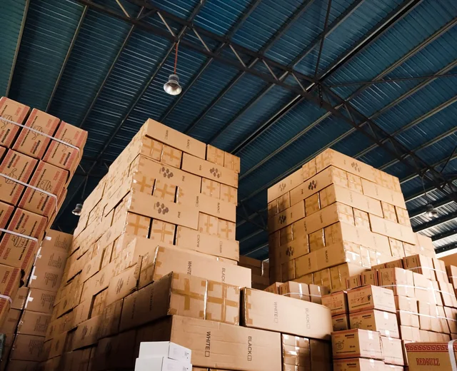 Export cartons stacked and palletised in the warehouse ready for international freight