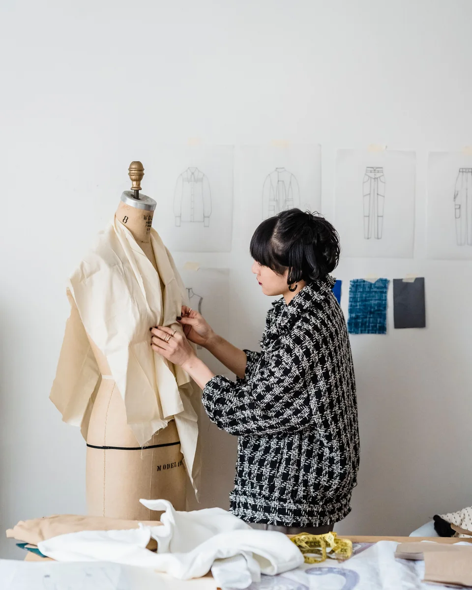 Independent streetwear label founder working on a first sample in the studio