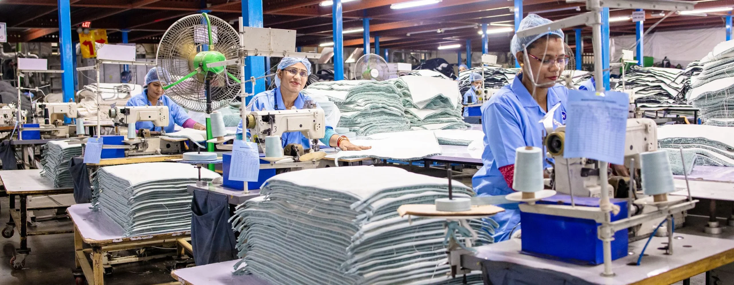 Sale Smart Sports cut and sew production floor with streetwear sewing lines running